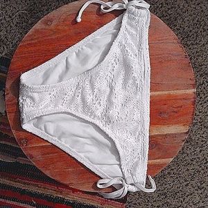 White swimming bottoms and size large